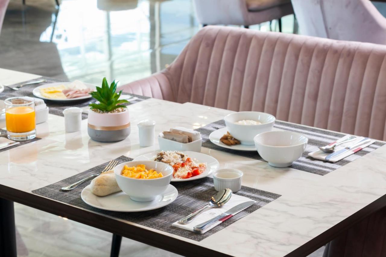 Mds Hotel Чильян Экстерьер фото A typical breakfast at the airport