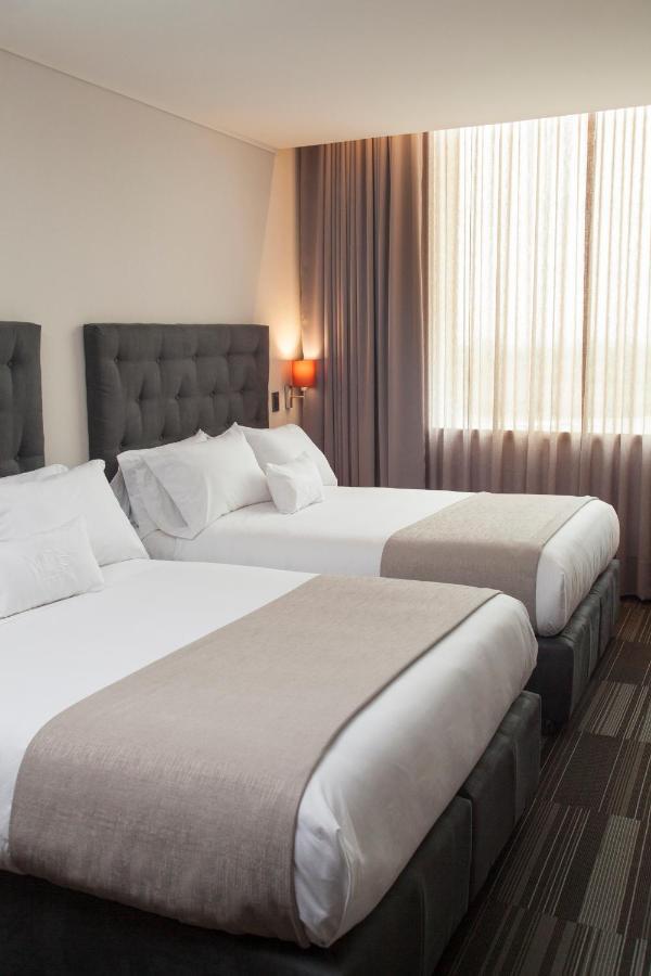 Mds Hotel Чильян Экстерьер фото A room at the hotel