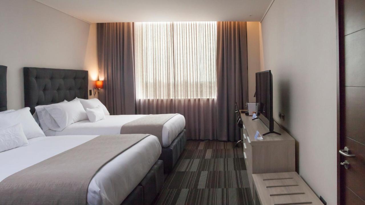 Mds Hotel Чильян Экстерьер фото A room at the hotel