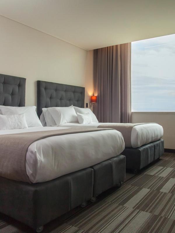 Mds Hotel Чильян Экстерьер фото A room at the hotel